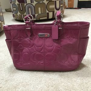 Purple patent leather coach purse. Gently used.
